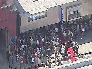 Paris Hilton drew a large crowd and stopped traffic during an appearance at Kitson on Thursday afternoon.